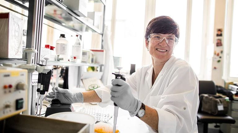 Researcher with equipment